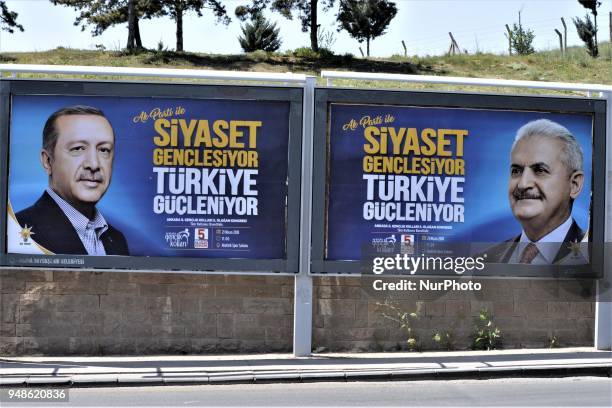 Billboards picturing Turkey's President Recep Tayyip Erdogan and Prime Minister Binali Yildirim are posted next to a road by the ruling Justice and...