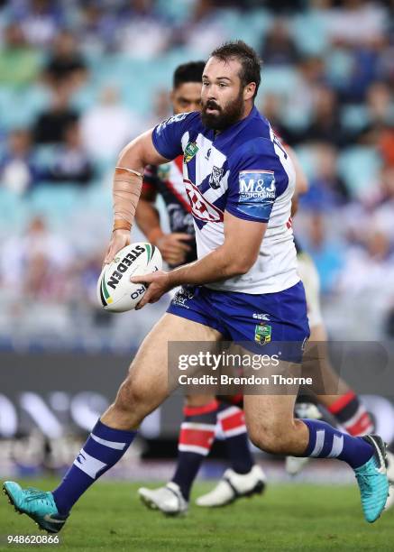 Aaron Woods of the Bulldogs runs the ball during the round seven NRL match between the Canterbury Bulldogs and the Sydney Roosters at ANZ Stadium on...