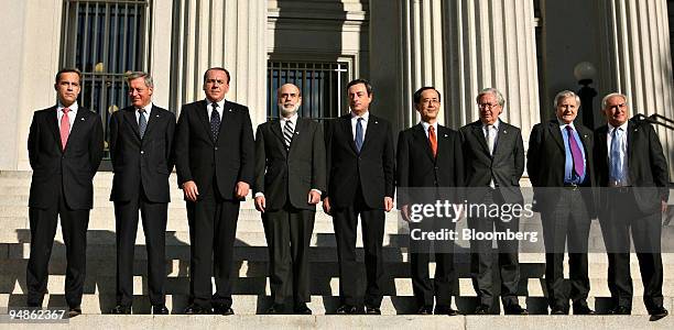 Bank Governors from the Group of Seven stand for a photo outside the U.S. Treasury Department in Washington, D.C., U.S., on Friday, Oct. 10, 2008....