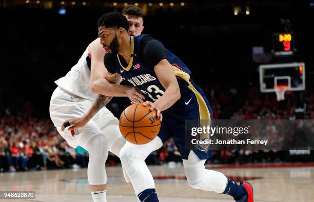 Anthony Davis of the New Orleans Pelicans in action against Jusuf Nurkic of the Portland Trail Blazers during Game Two of the Western Conference...