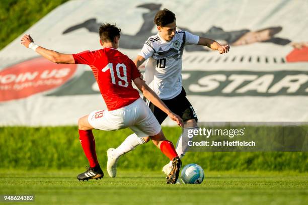 Felix Bacher of Austia and Nicolas-Gerrit Kuehn of Germany fight for the ball during the International friendly match between U18 Austria and U18...