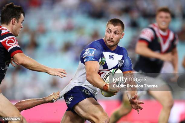 Kieran Foran of the Bulldogs runs the ball during the round seven NRL match between the Canterbury Bulldogs and the Sydney Roosters at ANZ Stadium on...