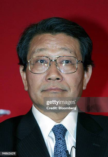 Masao Niwano, chief executive of Toshiba's nuclear unit, listens during a signing ceremony in London, Monday, February 6, 2006. Toshiba Corp.,...