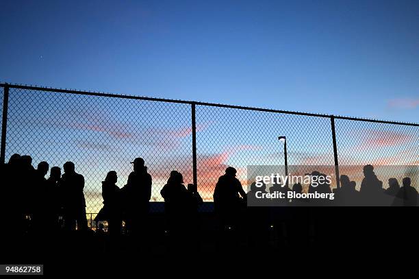 Supporters wait in line prior to a campaign rally with Senator Barack Obama of Illinois, Democratic presidential candidate, and former U.S. President...