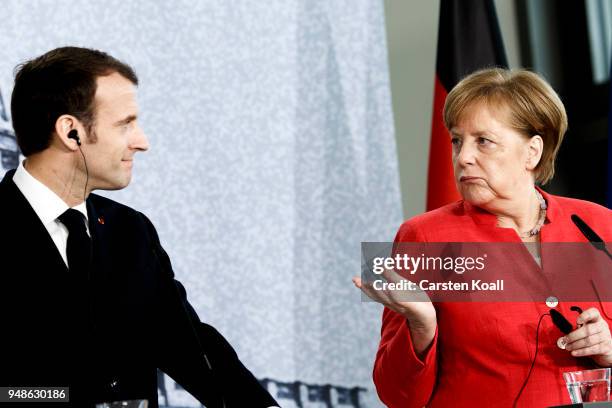 German Chancellor Angela Merkel and French President Emmanuel Macron attend a pressconference following a visit in the Humboldt Forum construction...