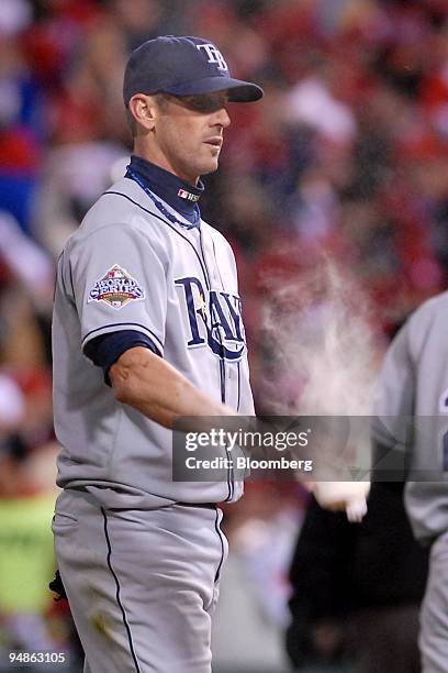 Grant Balfour of the Tampa Bay Rays uses a rosin bag after surrendering a go-ahead run to the Philadelphia Phillies in the sixth inning during the...