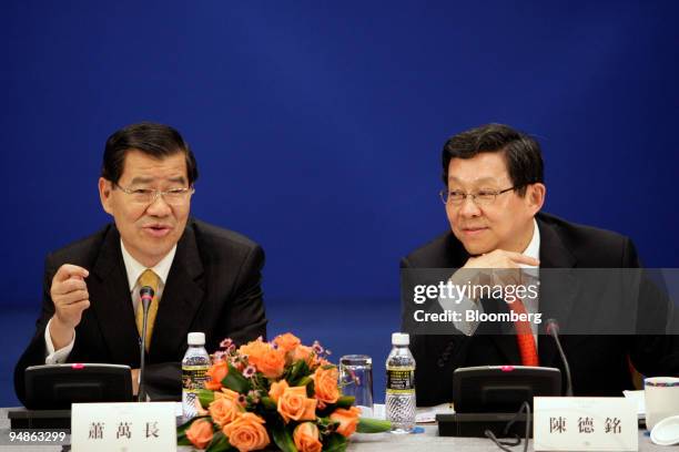 Vincent Siew, Taiwan's vice president-elect, left, attends a panel on Cross-Straits economic relationships between Taiwan and Mainland China with...