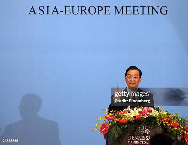 Chinese Premier Wen Jiabao delivers the opening address at a meeting of European and Asian finance ministers in Taida, China Sunday, June 26, 2005....