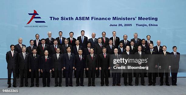 Finance ministers from Asia and Europe gather for a group photograph Sunday, June 26, 2005 at the meeting of European and Asian finance ministers in...