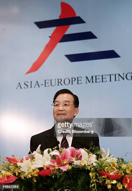 Chinese Premier Wen Jiabao delivers the opening address at a meeting of European and Asian finance ministers in Taida, China Sunday, June 26, 2005....