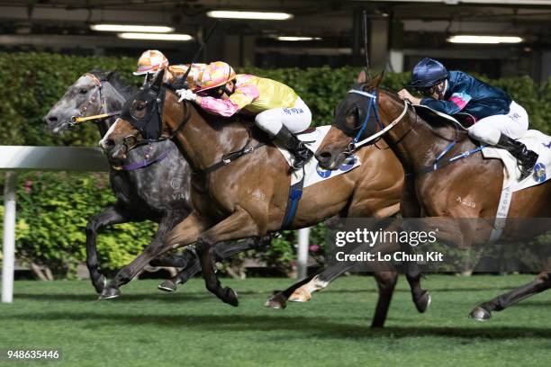 Jockey Keith Yeung Ming-lun riding Art Of Raw wins the Race 3 Kowloon Tsai Handicap at Happy Valley Racecourse on April 18, 2018 in Hong Kong, Hong...