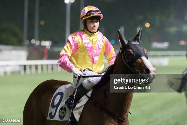 Jockey Keith Yeung Ming-lun riding Art Of Raw wins the Race 3 Kowloon Tsai Handicap at Happy Valley Racecourse on April 18, 2018 in Hong Kong, Hong...