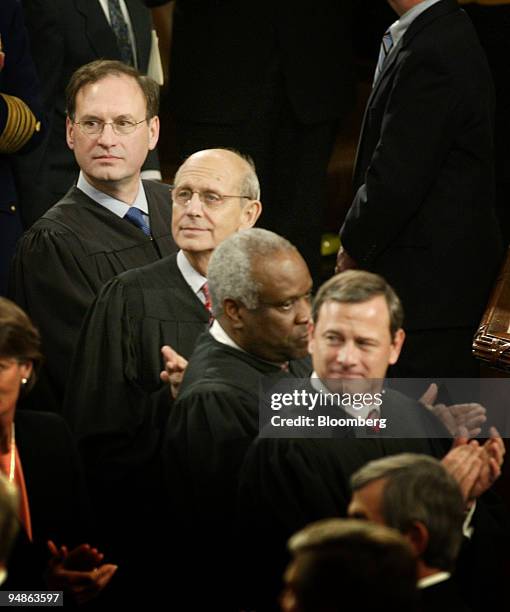 Members of the United States Supreme Court including Samuel Alito, left, Stephen Breyer, 2nd left, Clarence Thomas, 2nd right, and John Roberts,...