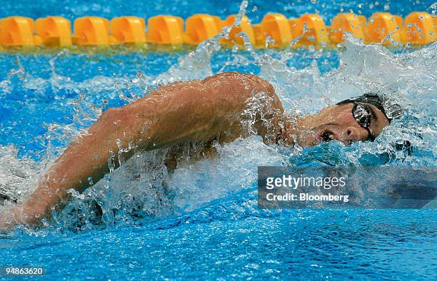 Michael Phelps of the U.S., takes a stroke in the Men's 200-meter freestyle final swimming event during day four of the 2008 Beijing Olympics in...