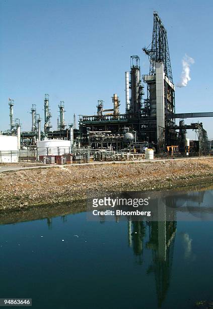 The Texaco oil refinery sits on a waterway in Long Beach,California on June 24, 2005. Crude oil reached $60 a barrel in New York for a second day on...