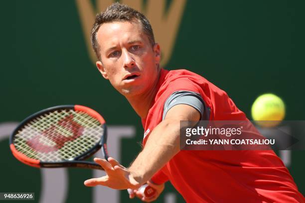Germany's Philipp Kohlschreiber returns the ball to Bulgaria's Grigor Dimitrov during their tennis match as part of the Monte-Carlo ATP Masters...