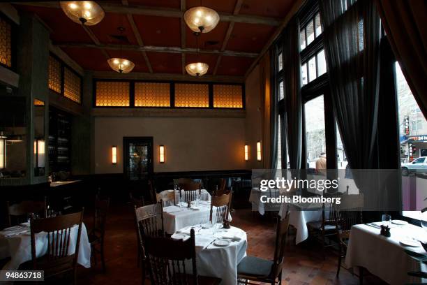 Tables are ready for dinner service at Ago, a restaurant located at 377 Greenwich Street in New York, U.S., on Monday, April 7, 2008. Actor Robert...