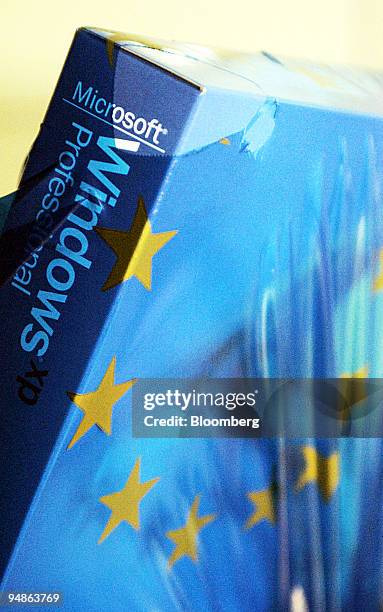 Microsoft Windows software box inside a shopping bag decorated with the 12 star symbol of the European Union in Brussels, Belgium, Tuesday March 23,...