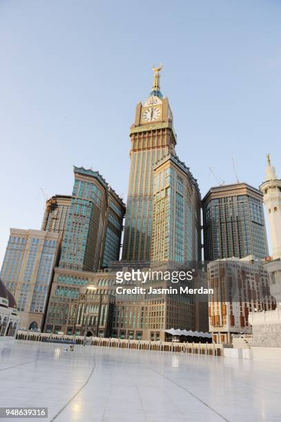 amous clock tower next to mecca grand mosque - mecca stock pictures, royalty-free photos & images