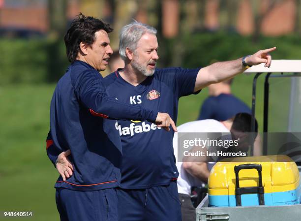 Manager Chris Coleman chats with Kit Symons during a Sunderland AFC training session at The Academy of Light on April 19, 2018 in Sunderland, England.