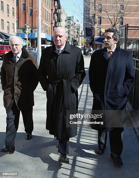 Dennis Kozlowski, center, former CEO, Tyco International, and his lawyers Stephen Kaufman, left, and Andrew Kaufman, right, return to State Supreme...