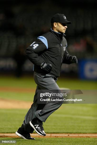 Umpire Mark Wagner officiates in the game between the Chicago White Sox and the Oakland Athletics at Oakland Alameda Coliseum on April 16, 2018 in...