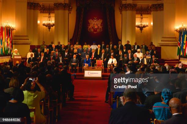Commonwealth Heads of State listen as Queen Elizabeth delivers a speech during the formal opening of the Commonwealth Heads of Government Meeting in...