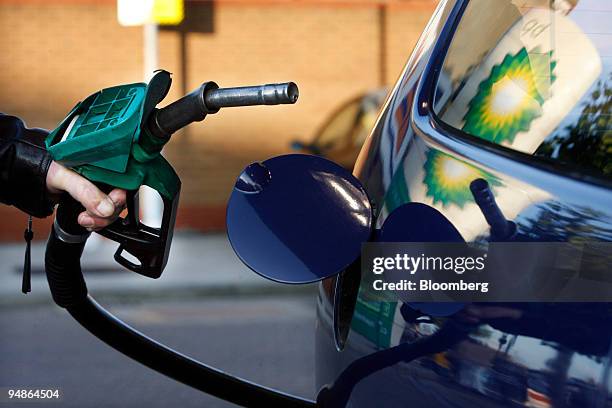 Motorist fills his car at a BP gas station in London, U.K., on Monday, Oct. 27, 2008. BP Plc, Europe's second-biggest oil company, said profit rose...