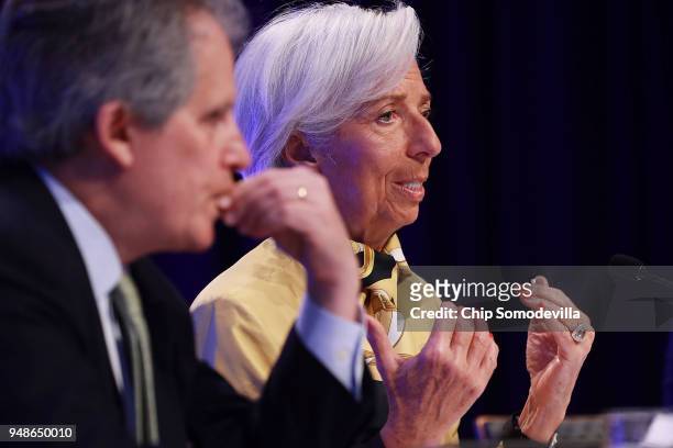 International Monetary Fund Managing Director Christine Lagarde and IMF First Deputy Managing Director David Lipton conduct a news conference at IMF...