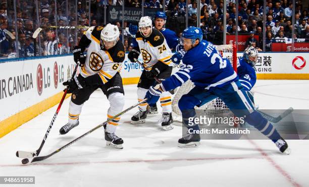 Rick Nash of the Boston Bruins skates against Nikita Zaitsev of the Toronto Maple Leafs in Game Three of the Eastern Conference First Round during...