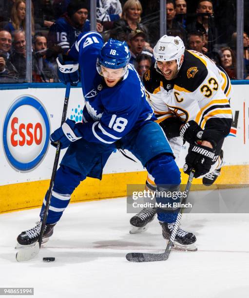 Andreas Johnsson of the Toronto Maple Leafs skates against Zdeno Chara of the Boston Bruins in Game Three of the Eastern Conference First Round...