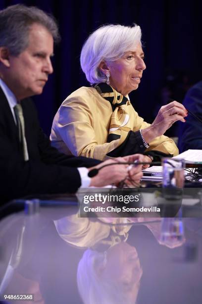 International Monetary Fund Managing Director Christine Lagarde and IMF First Deputy Managing Director David Lipton conduct a news conference at IMF...