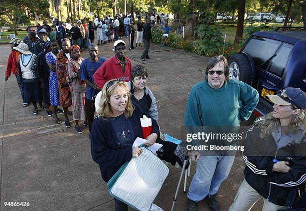 Zimbabwe queue to vote at a school in the suburb of Greendale, in Harare, Zimbabwe, on Saturday, March 29, 2008. Robert Mugabe's 28-year era of...