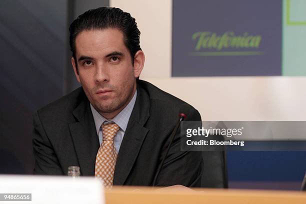 Leonel Schofecker, a manager in charge of investor relations at America Movil SA listens at the Latibex conference in Madrid, Spain, Thursday,...
