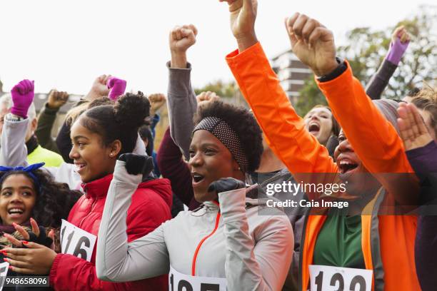 Cheering For Running Racers 665 Crowd Cheering Race Stock Photos, High-Res Pictures, and Images ...