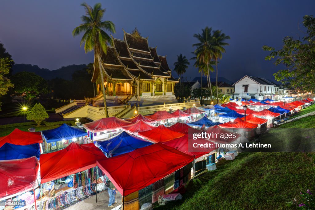 Night market and Haw Pha Bang temple in Luang Prabang