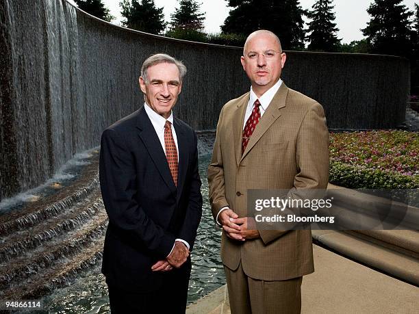 Leonard Briskman, deputy chief for business management for the U.S. Marshals Service, left, and Eben Morales, chief of the asset forfeiture office,...