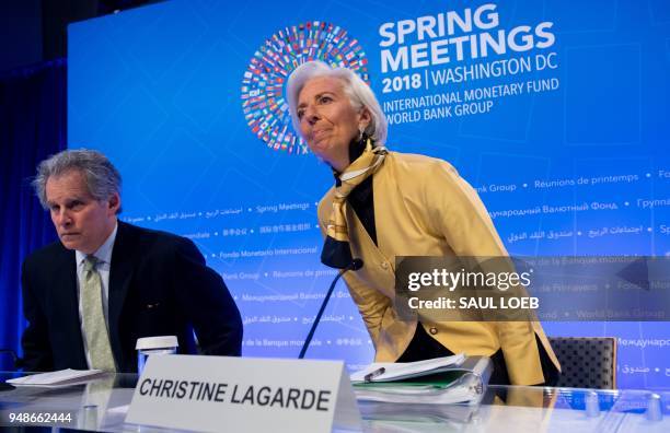 Managing Director Christine Lagarde and IMF First Deputy Managing Director David Lipton arrive to hold a press conference during the 2018 Spring...