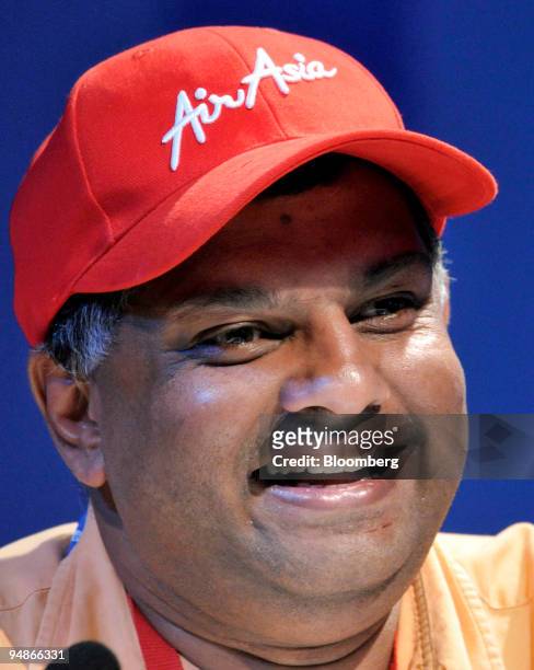 Tony Fernandes, chief executive officer of AirAsia Bhd., laughs during the Amadeus Global Airline forum in Bangkok, Thailand, on Thursday, April 3,...