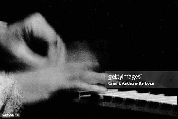 Close-up of American Jazz musician Cecil Taylor's hands as he plays piano onstage at the Sweet Basil nightclub, New York, New York, 1989.