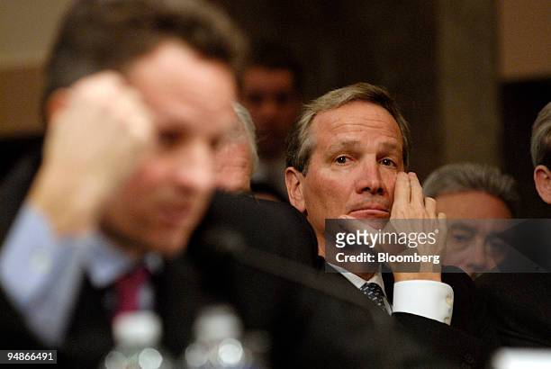 Alan Schwartz, president and chief executive officer of Bear Stearns Cos., center, listens to Timothy Geithner, president of the New York Federal...