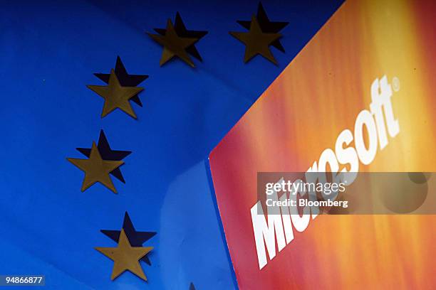 Box with the Microsoft logo on it standing on a shopping bag, decorated with the 12 star European Union symbol, is arranged in Brussels, Belgium,...