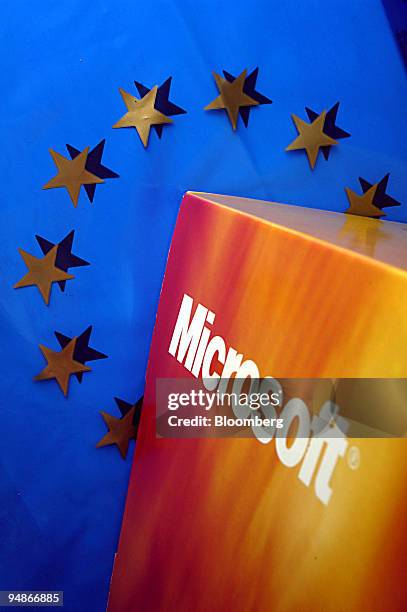 Box with the Microsoft logo on it standing on a shopping bag, decorated with the 12 star European Union symbol, is arranged in Brussels, Belgium,...