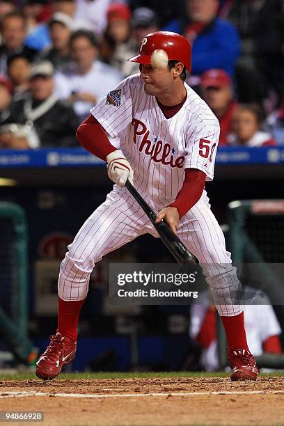 Jamie Moyer of the Philadelphia Phillies pops a bunt up for an out during game three of the Major League Baseball World Series against the Tampa Bay...