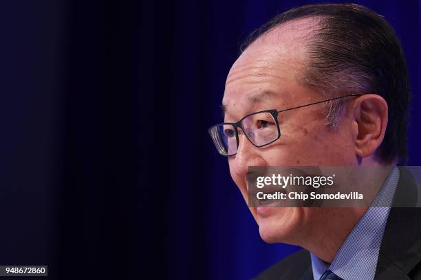 World Bank President Jim Yong Kim answers reporters' questions during a news conference at International Monetary Fund Headquarters April 19, 2018 in...