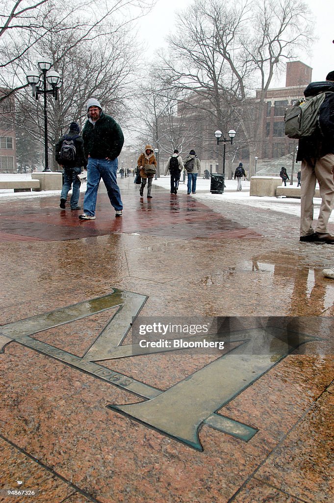 Students walk across the "diag" in the center of the Univers