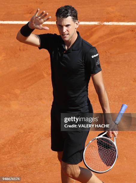 Austria's Dominic Thiem celebrates after winning his men's single tennis match against Serbia's Novak Djokovic at the Monte-Carlo ATP Masters Series...