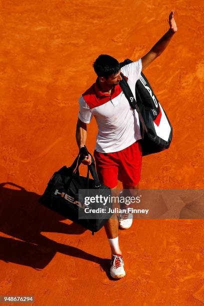 Novak Djokovic of Serbia waves to fans after his men's singles match against Dominic Thiem of Austria on day five of the Rolex Monte-Carlo Masters at...