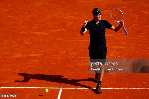 Dominic Thiem of Austria celebrates beating Novak Djokovic of Serbia in his his men's singles 3rd round match on day five of the Rolex Monte-Carlo...