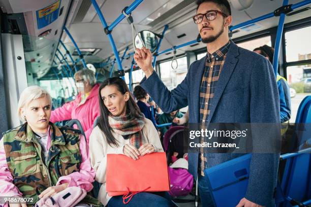 stinkende kerl im öffentlichen bus - old man funny face black and white stock-fotos und bilder